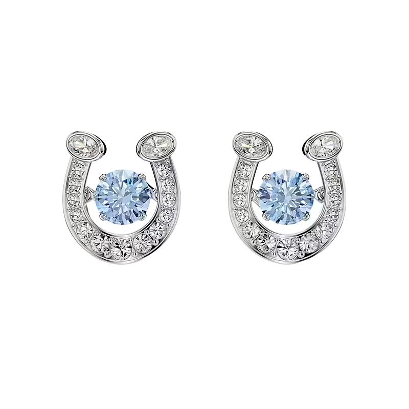 BRINCOS SWAROVSKI SYMBOLICA CRISTAIS FERRO DE CAVALO 5747543 SILVER/BLUE
